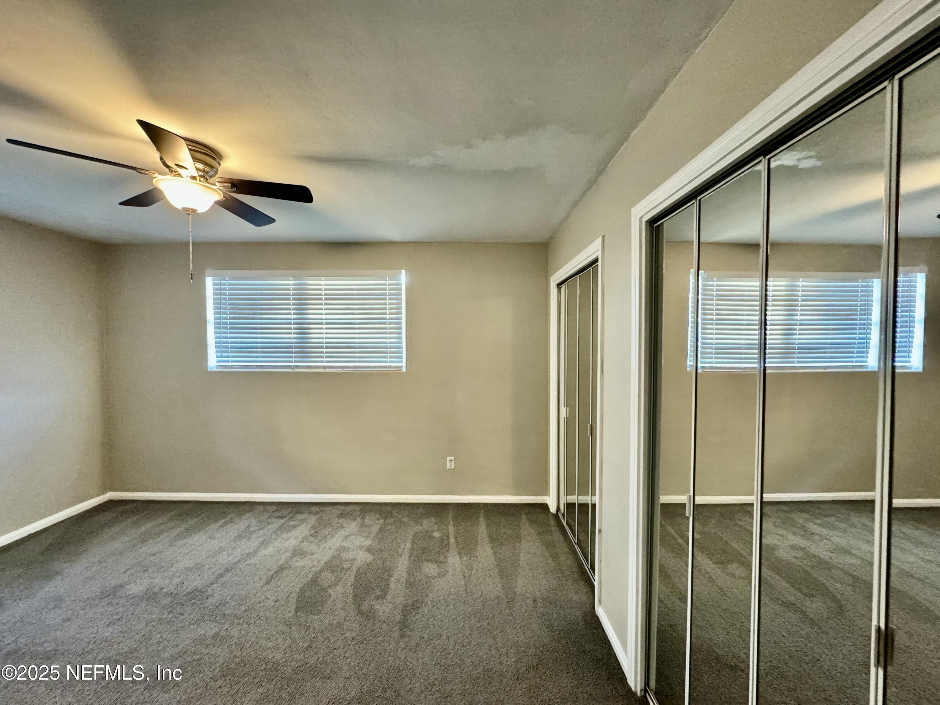1157 Gunka Road Jacksonville, FL 32216 - Photo 14 of 24 a view of an empty room