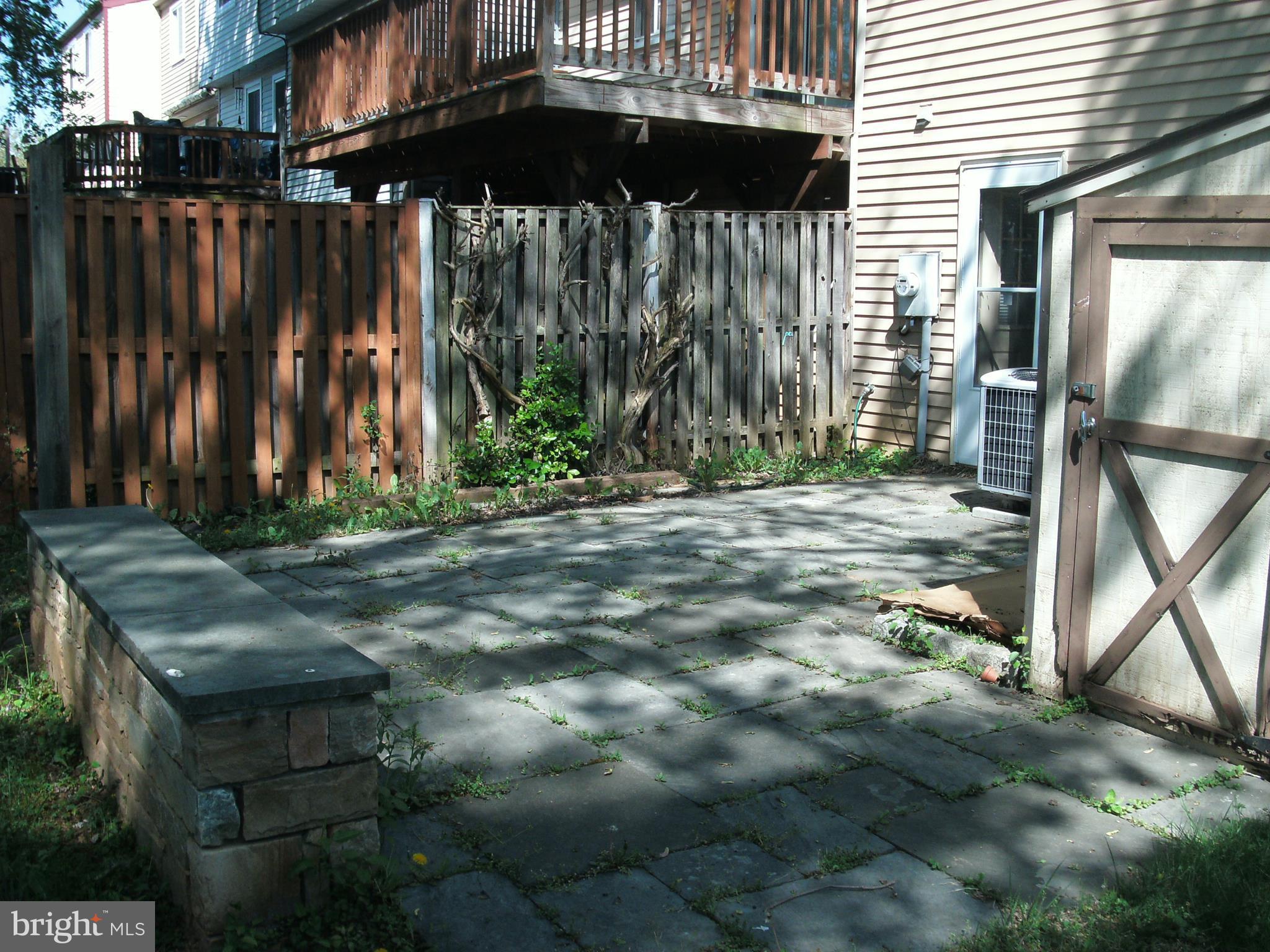 1411 Farmcrest Way Silver Spring, MD 20905 - Photo 28 of 28 Exterior (Rear) - flagstone patio & shed