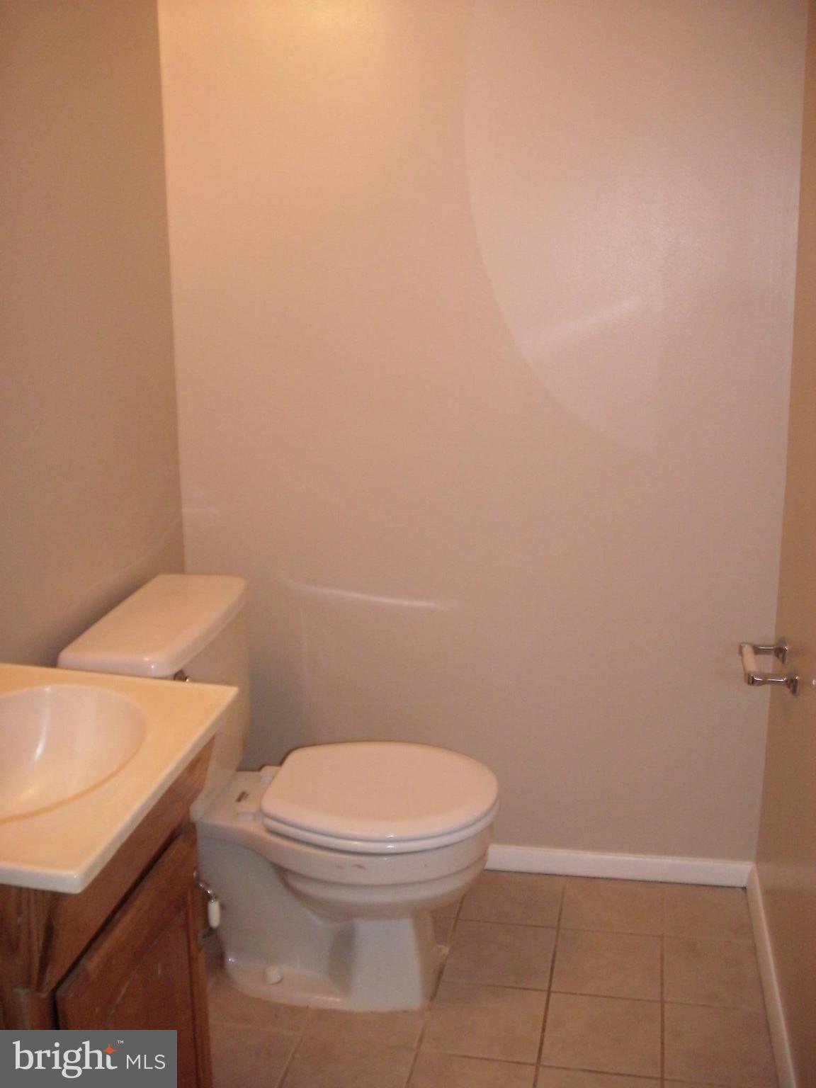 1411 Farmcrest Way Silver Spring, MD 20905 - Photo 7 of 28 Half Bath on Main Level
