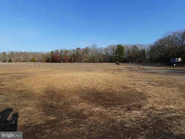 a view of a road with an ocean view