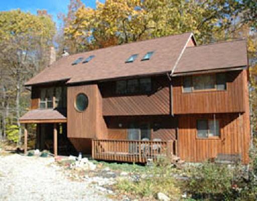 25 Stage Road Brookfield, CT 06804 - Photo 1 of 1 a view of a house with a yard and wooden fence