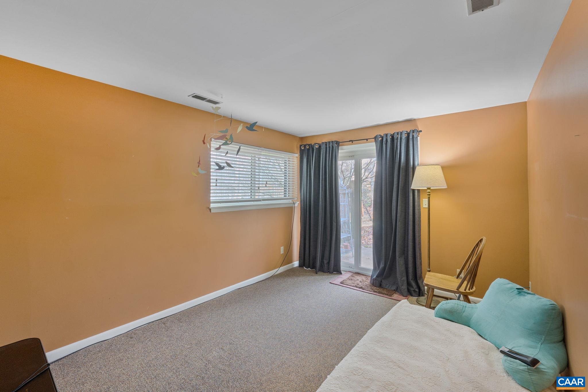 1212 Chatham Ridge Charlottesville, VA 22901 - Photo 14 of 17 a bedroom with a bed and a window