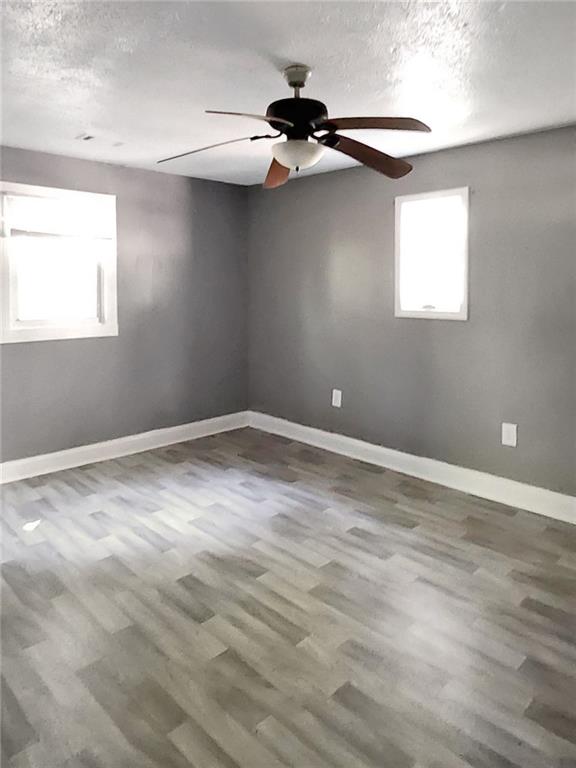 147 Cobb Road Covington, GA 30014 - Photo 17 of 21 a view of a window in an empty room
