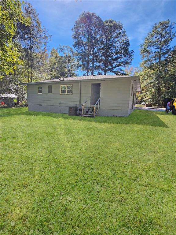 147 Cobb Road Covington, GA 30014 - Photo 19 of 21 a view of a yard in front of a house