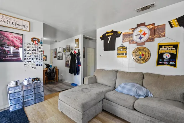 a living room with furniture and a couch