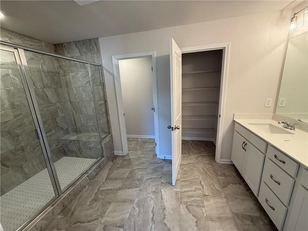 5139 Longview Run Decatur, GA 30035 - Photo 14 of 16 a bathroom with a shower and a sink