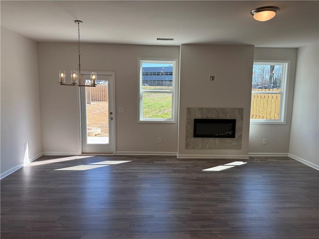 5139 Longview Run Decatur, GA 30035 - Photo 6 of 16 a view of an empty room with wooden floor and a window