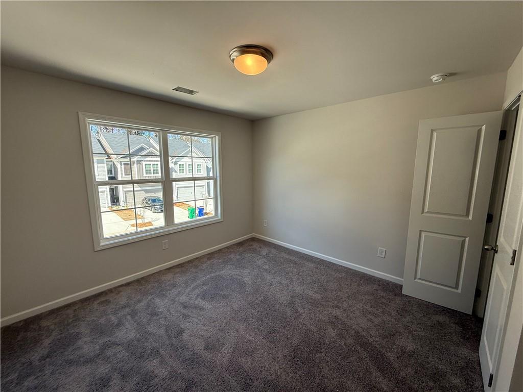 5139 Longview Run Decatur, GA 30035 - Photo 7 of 16 an empty room with windows and window