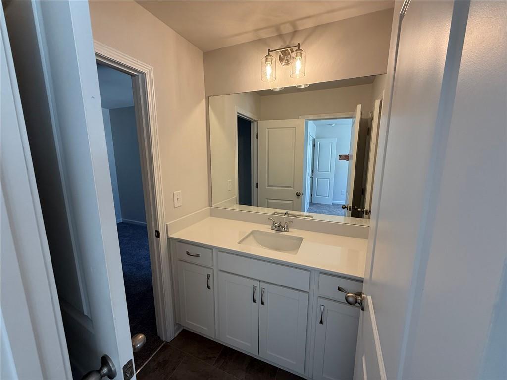 5139 Longview Run Decatur, GA 30035 - Photo 8 of 16 a bathroom with a double vanity sink and a mirror