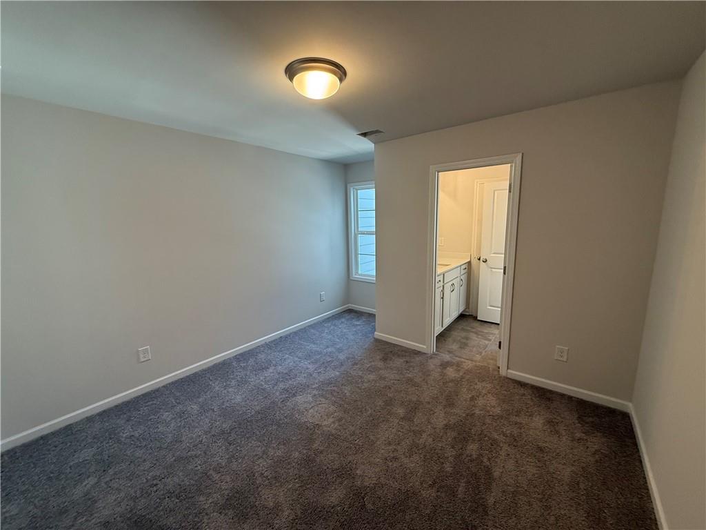 5139 Longview Run Decatur, GA 30035 - Photo 10 of 16 an empty room with windows