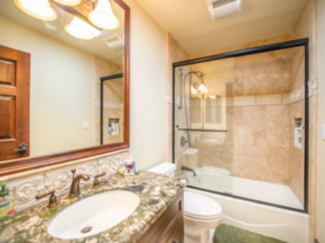 632 Fairway Circle Hillsborough, CA 94010 - Photo 11 of 18 a bathroom with a sink and a mirror
