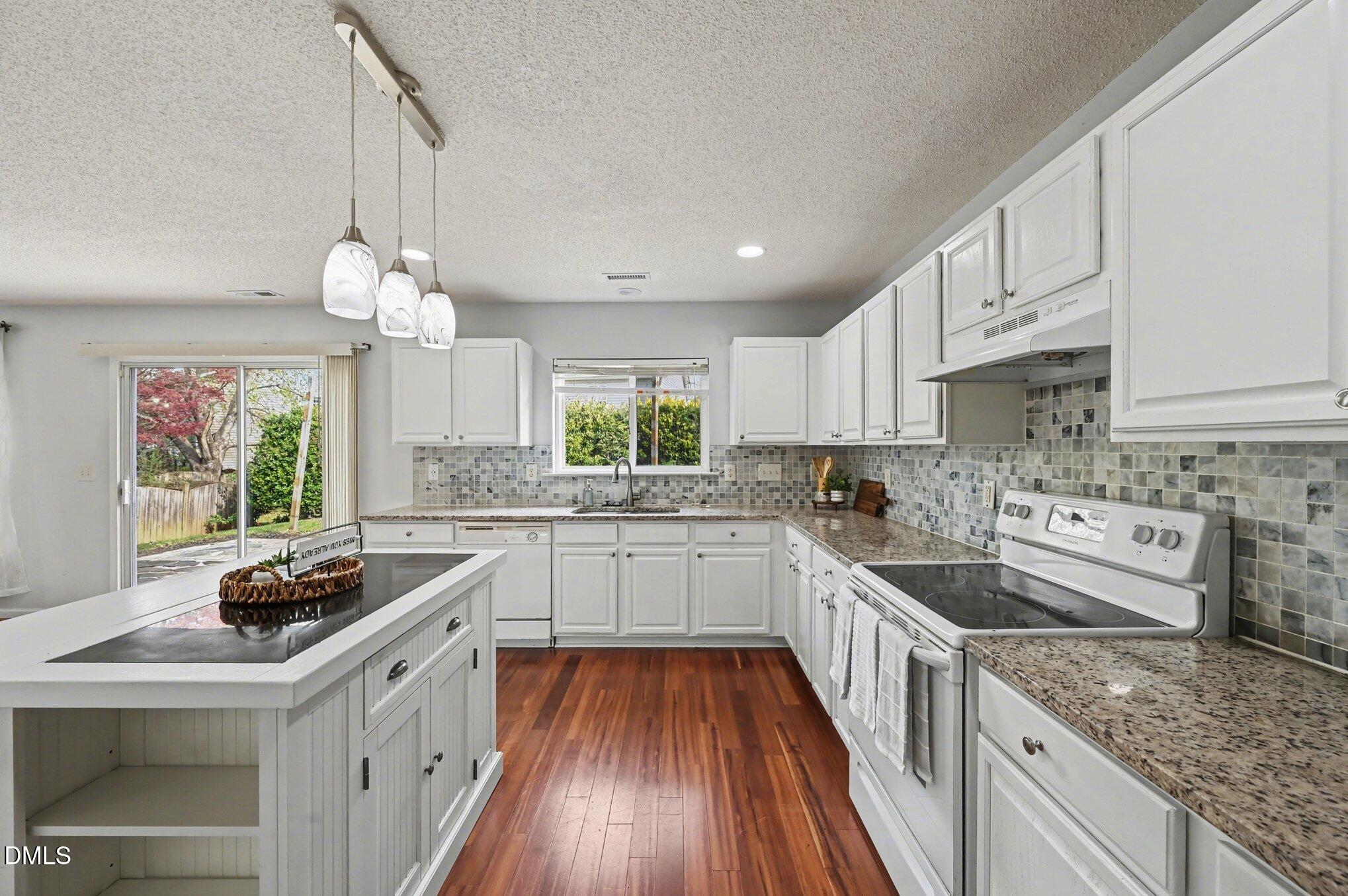 116 Ryder Cup Circle Raleigh, NC 27603 - Photo 10 of 29 Open Kitchen Featuring Plenty of Cabinet Storage