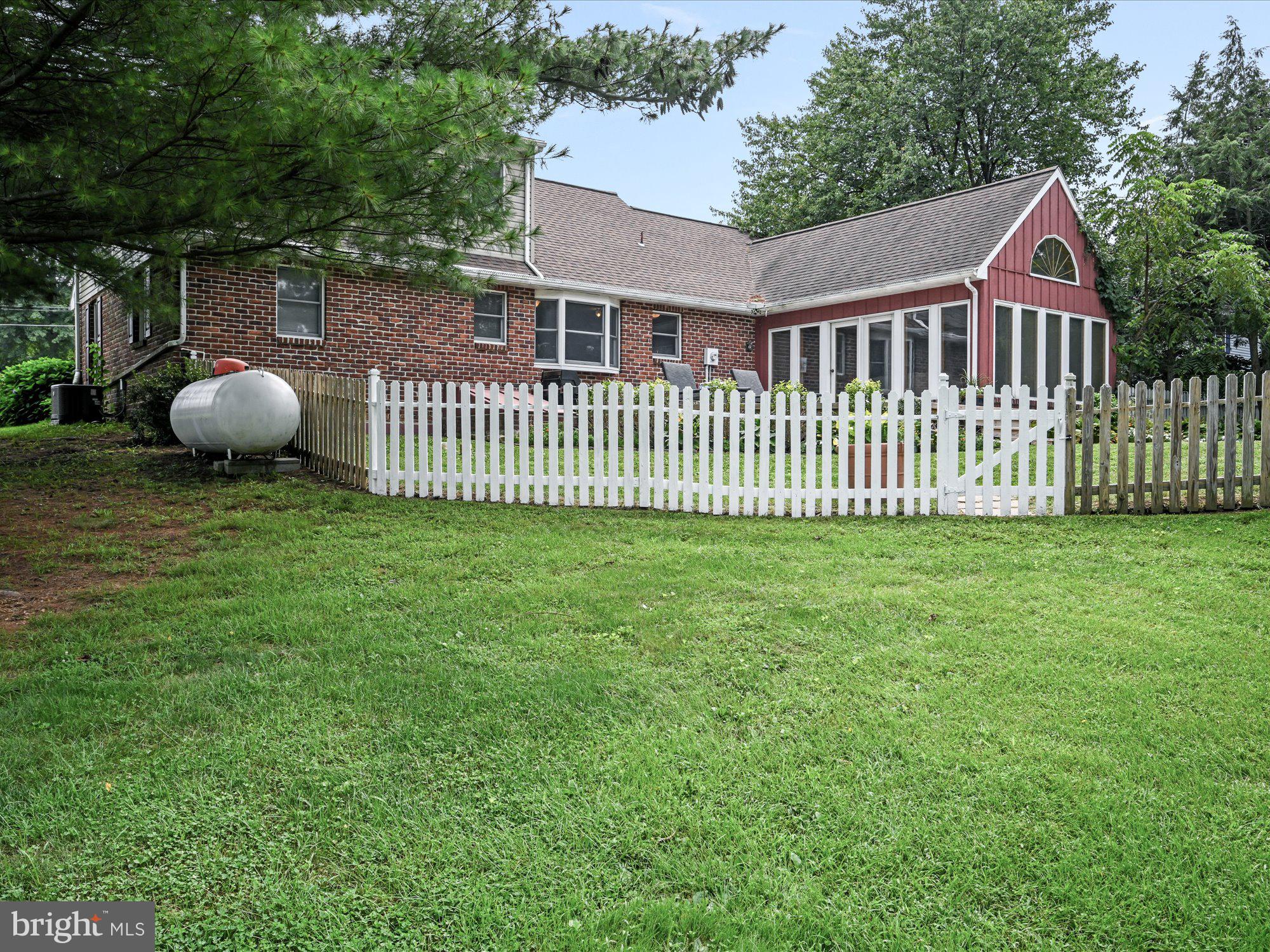 1030 White Oak Road Manheim, PA 17545 - Photo 41 of 53 Side yard with propane tank & view of the back