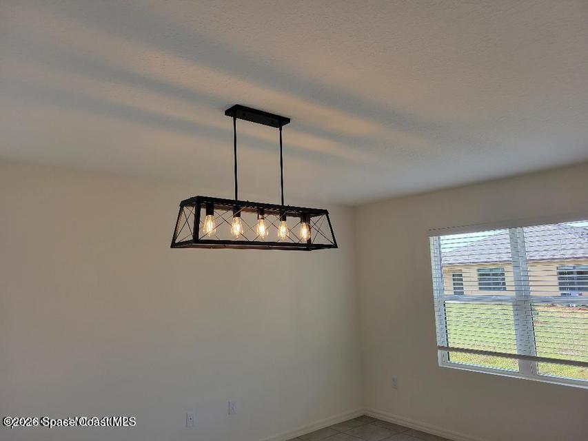 3440 Foggy Mist Road Southeast Palm Bay, FL 32909 - Photo 4 of 14 Dining Room