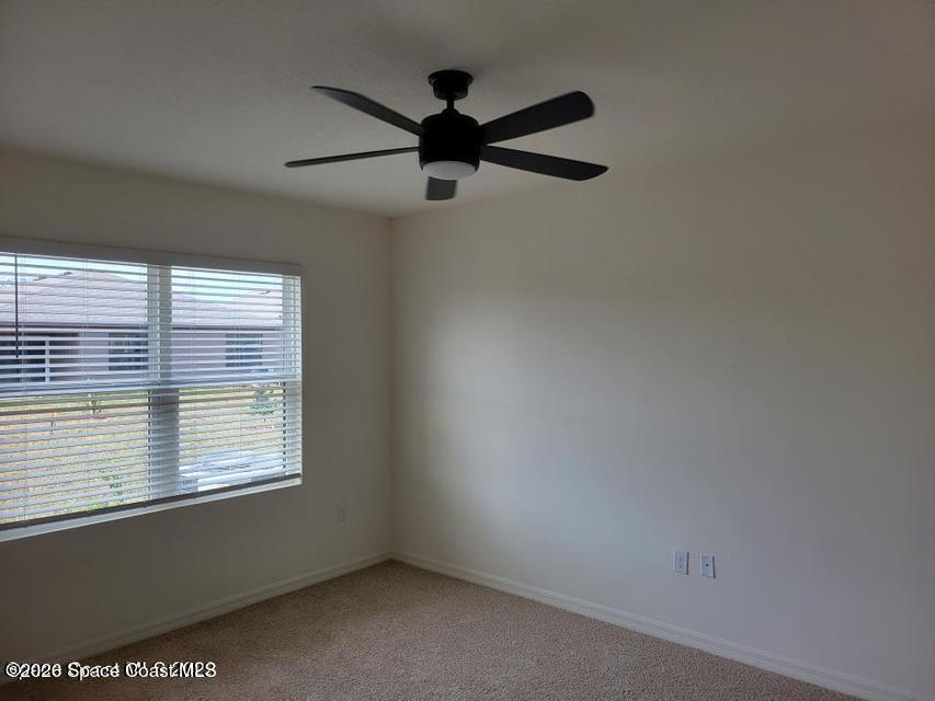 3440 Foggy Mist Road Southeast Palm Bay, FL 32909 - Photo 6 of 14 Primary Bedroom