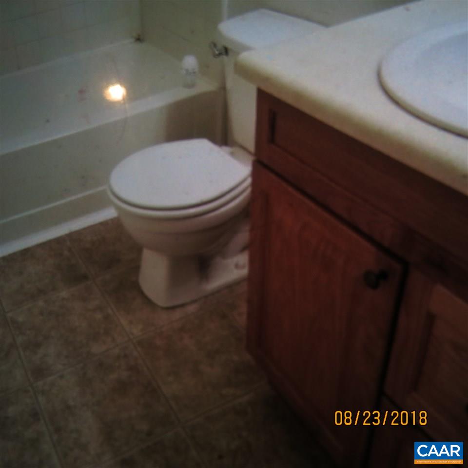 2010 Ridge Road Palmyra, VA 22963 - Photo 11 of 14 a white toilet sitting next to a sink