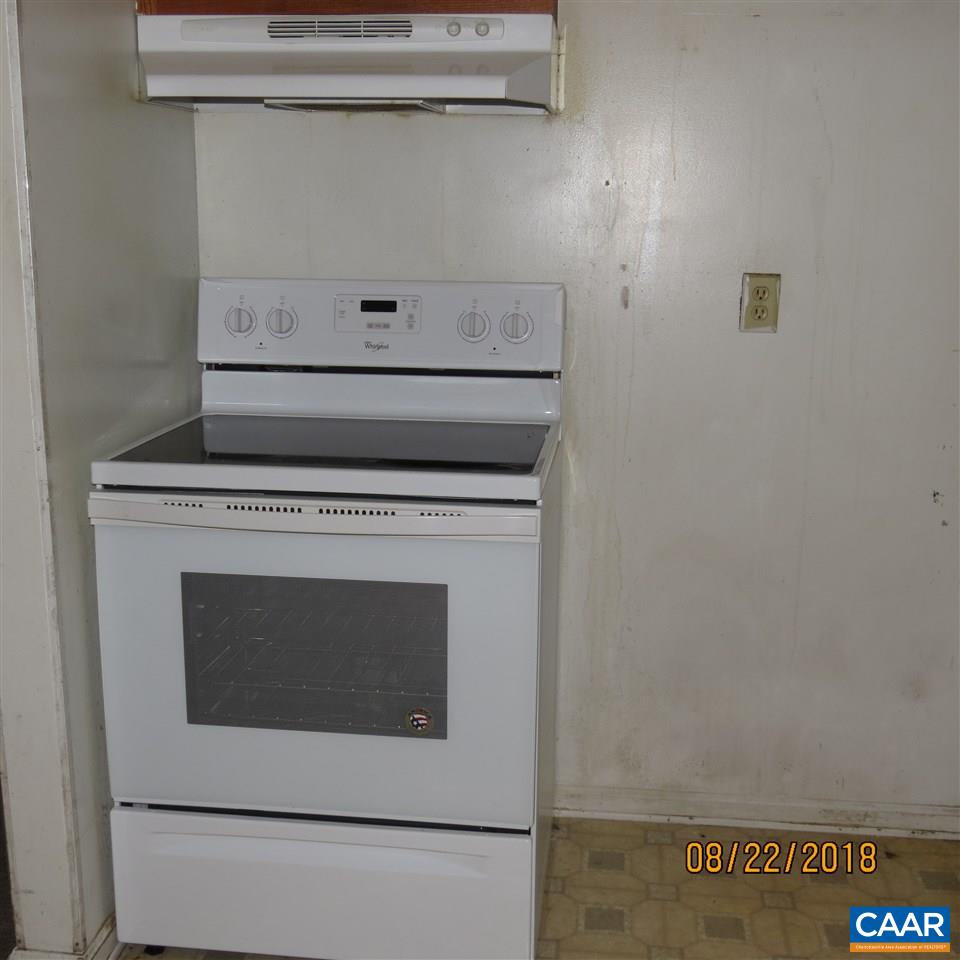 2010 Ridge Road Palmyra, VA 22963 - Photo 10 of 14 a stove top oven sitting inside of a kitchen