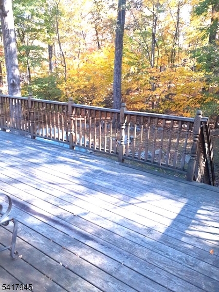 47 Indian Trail Hopatcong, NJ 07821 - Photo 13 of 17 a view of balcony with wooden floor