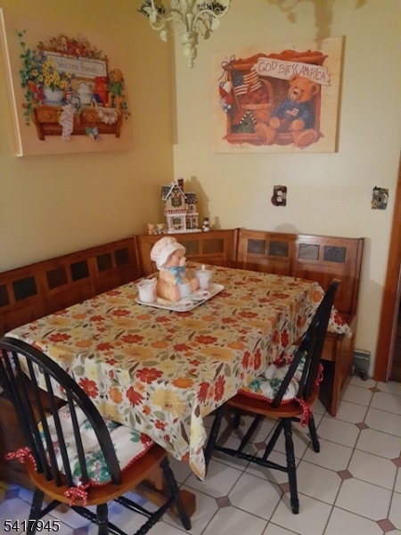 47 Indian Trail Hopatcong, NJ 07821 - Photo 14 of 17 a dining room table with chairs and table