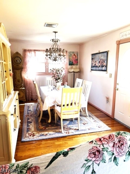47 Indian Trail Hopatcong, NJ 07821 - Photo 8 of 17 a view of a dining room with furniture