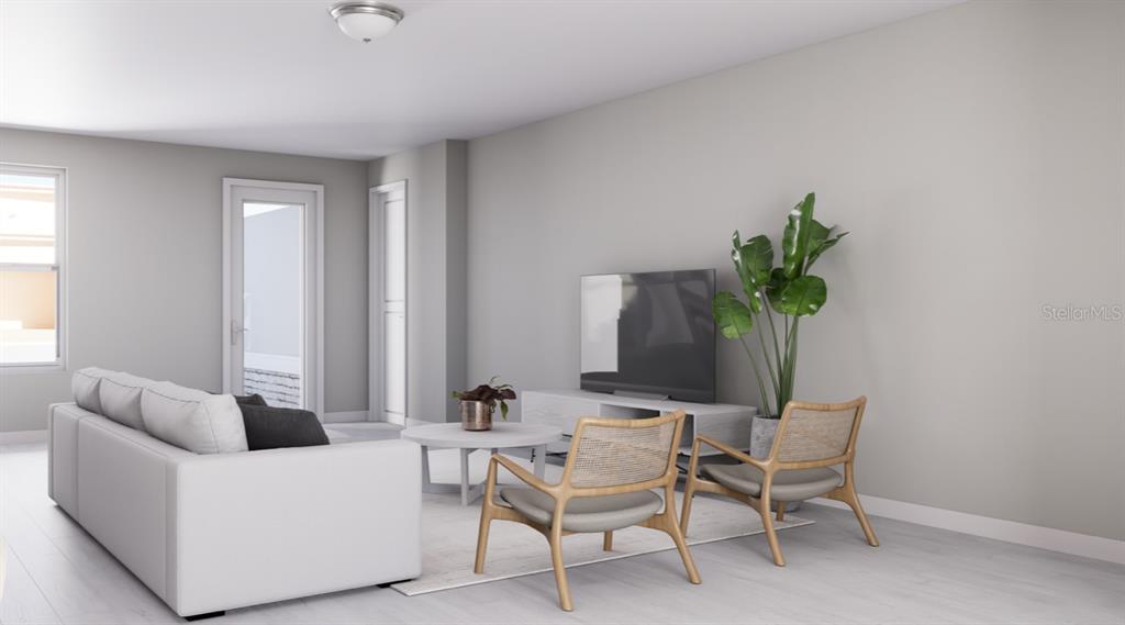 6499 Southwest 117th Street Ocala, FL 34476 - Photo 3 of 9 a living room with furniture and a potted plant