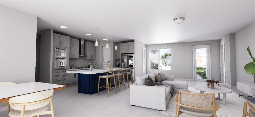 6499 Southwest 117th Street Ocala, FL 34476 - Photo 5 of 9 a view of kitchen with kitchen island wooden cabinets and stainless steel appliances