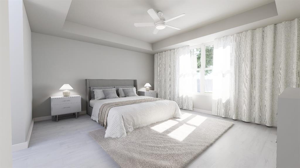 6499 Southwest 117th Street Ocala, FL 34476 - Photo 6 of 9 a bedroom with a bed and a chandelier