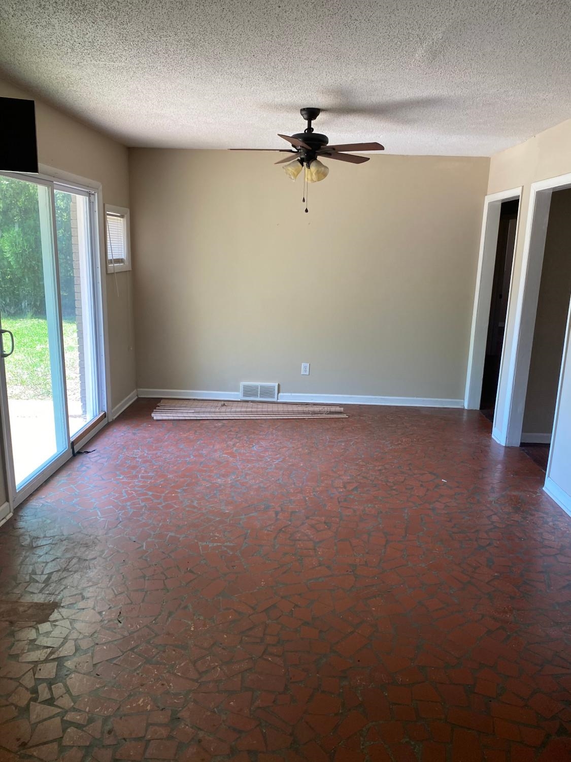 53 West Rollins Road Memphis, TN 38109 - Photo 12 of 16 a view of an empty room with a window