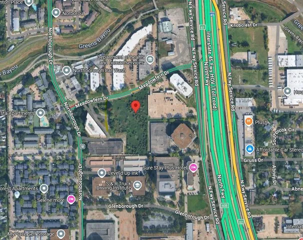 an aerial view of a fireplace with table and chairs