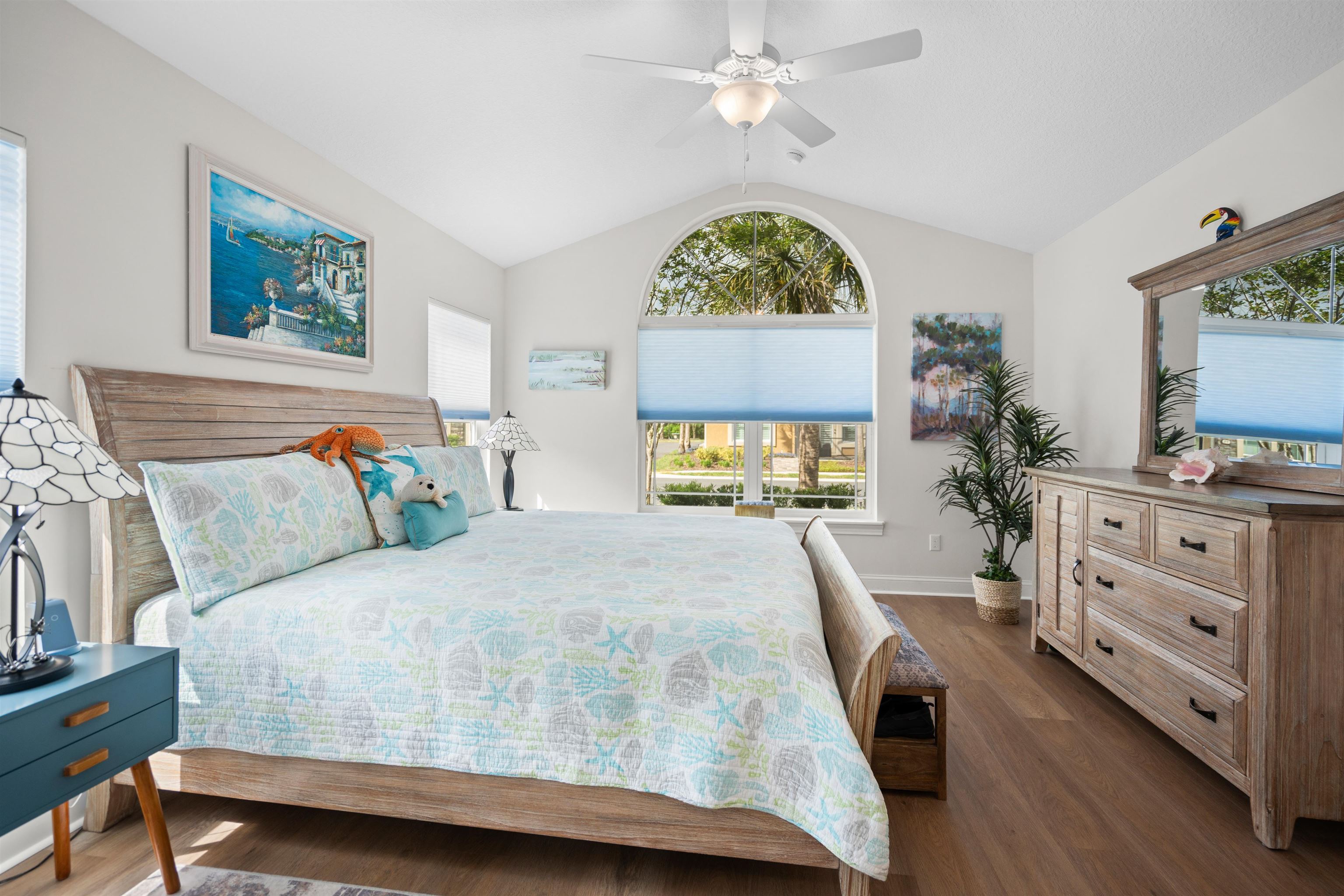 102 Timoga Trail St. Augustine, FL 32084 - Photo 24 of 44 a bedroom with a bed and a flat tv screen on dresser