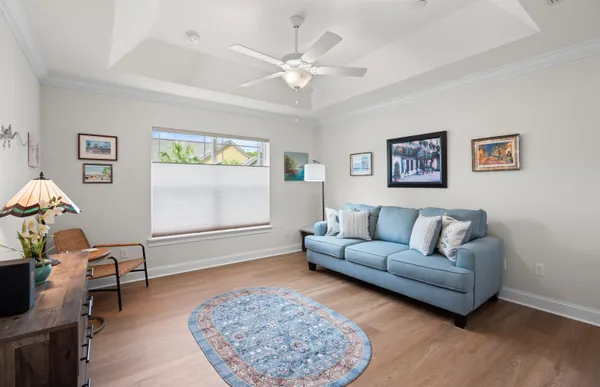 a living room with furniture and a window