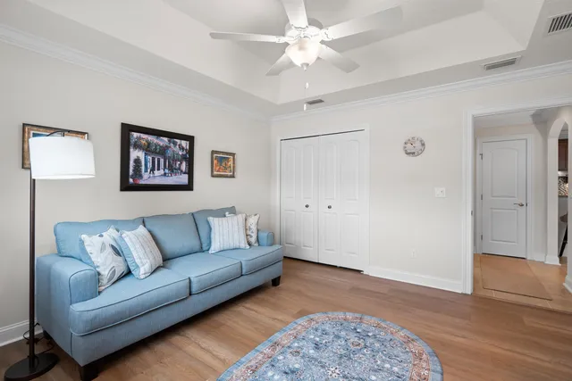 a living room with furniture and a rug