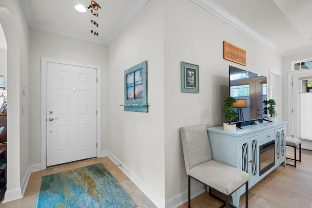 a living room with a couch and a flat screen tv