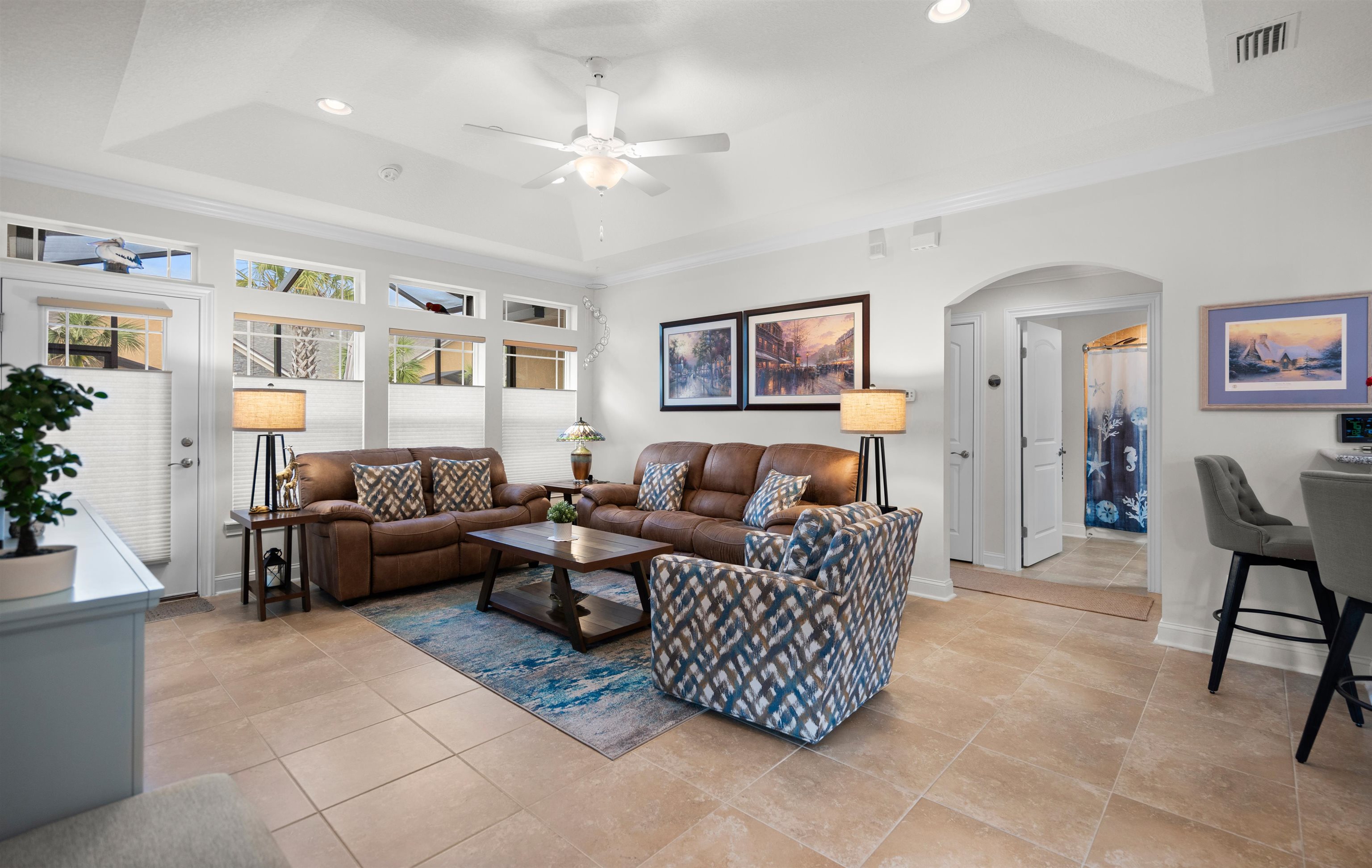 102 Timoga Trail St. Augustine, FL 32084 - Photo 6 of 44 a living room with furniture and a chandelier