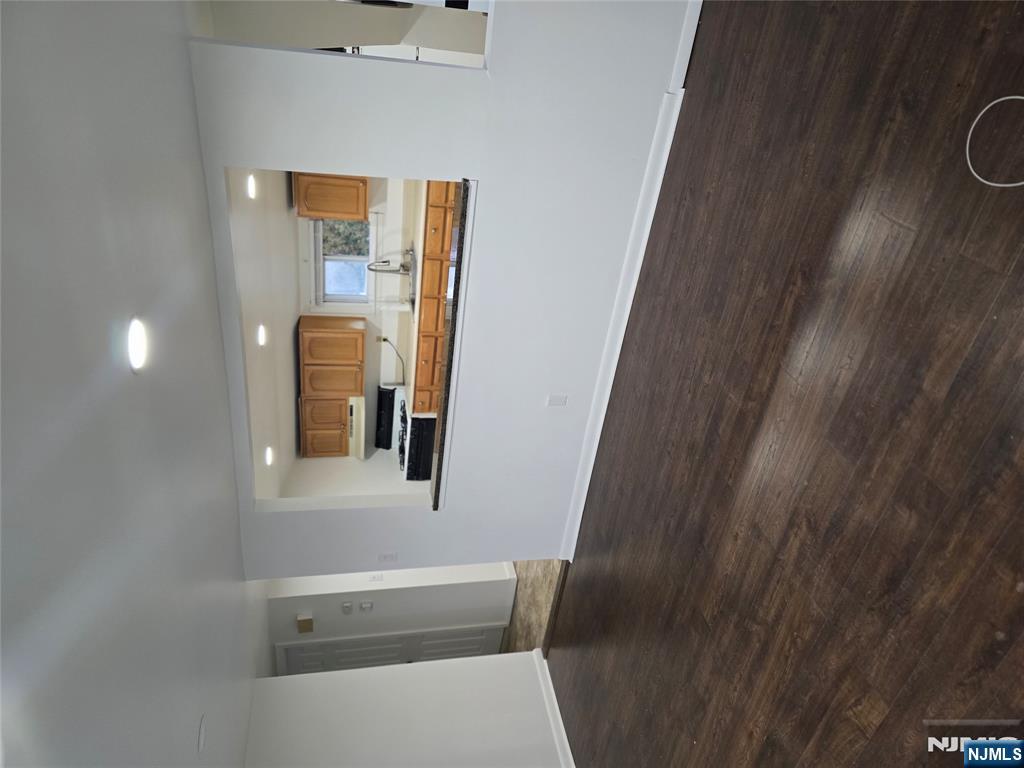 18 Donna Drive, Unit 2 Wood-Ridge, NJ 07075 - Photo 12 of 15 a view of kitchen with wooden floor