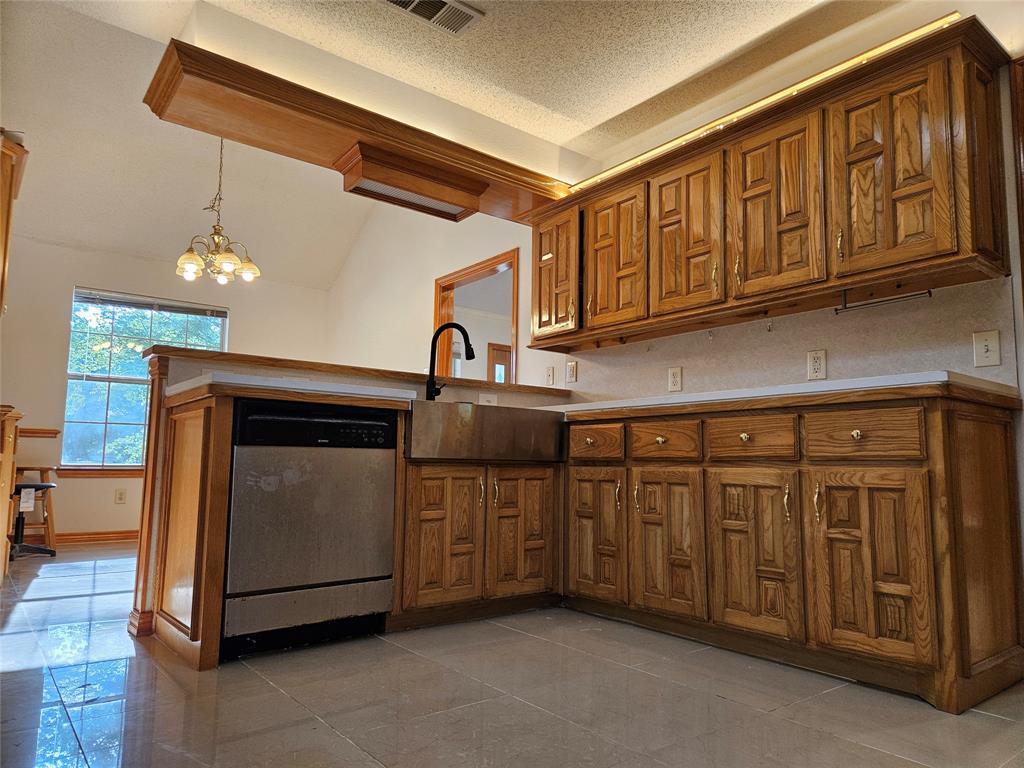 234 East Fork Road Sunnyvale, TX 75182 - Photo 6 of 32 a kitchen with stainless steel appliances granite countertop a sink and cabinets