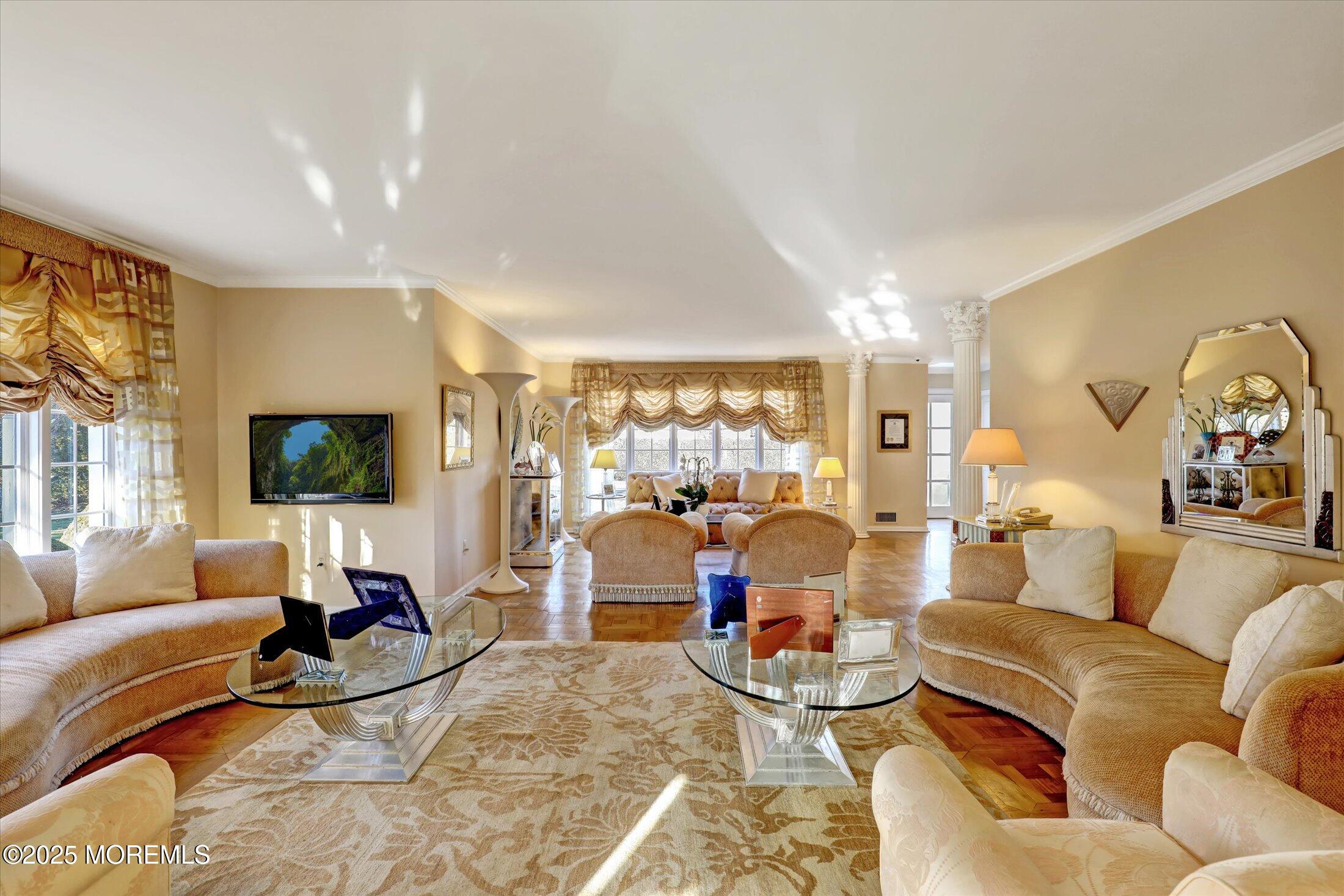 12 Woodford Road Deal, NJ 07723 - Photo 15 of 77 a living room with furniture and a flat screen tv