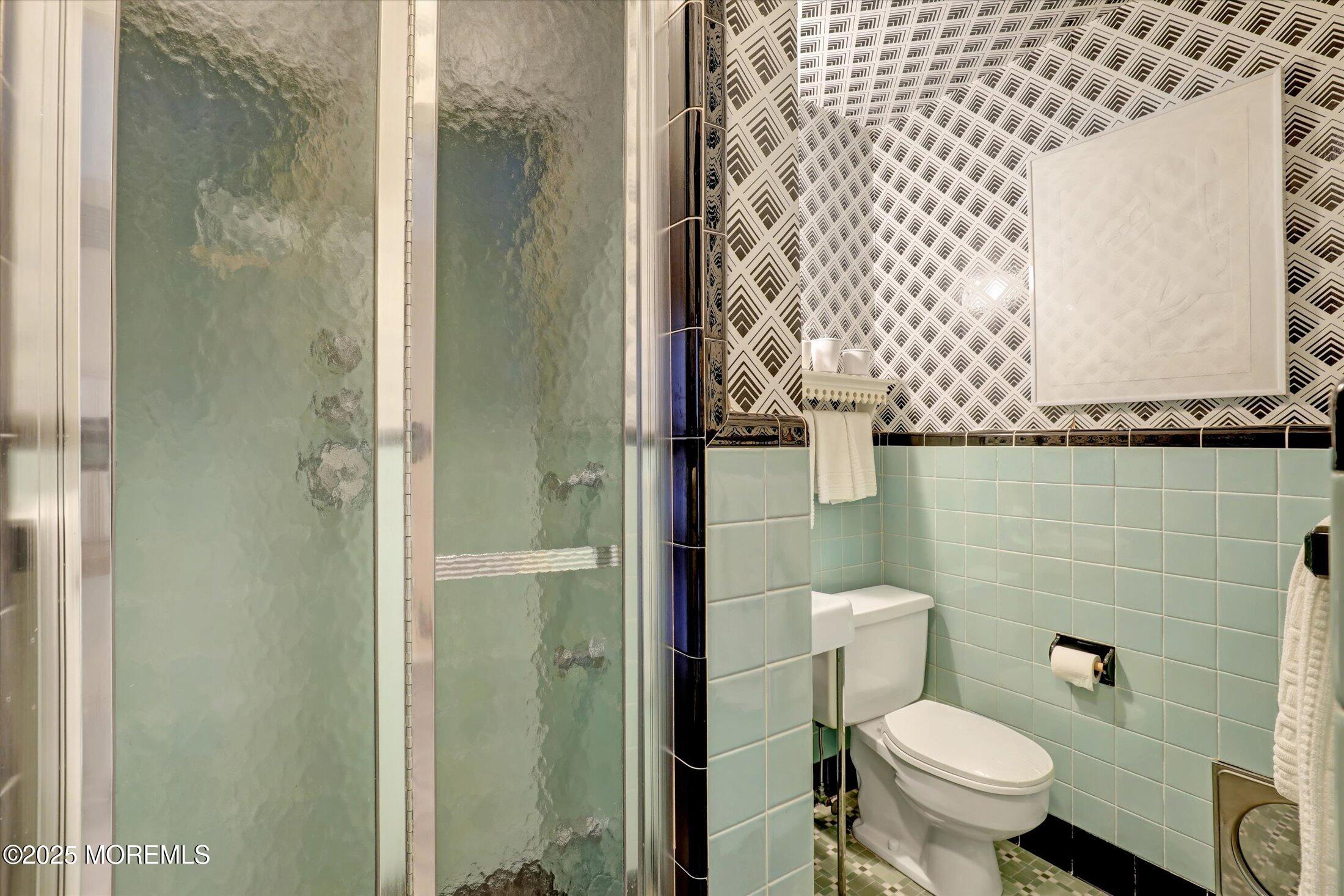 12 Woodford Road Deal, NJ 07723 - Photo 40 of 77 a bathroom with a toilet and a shower