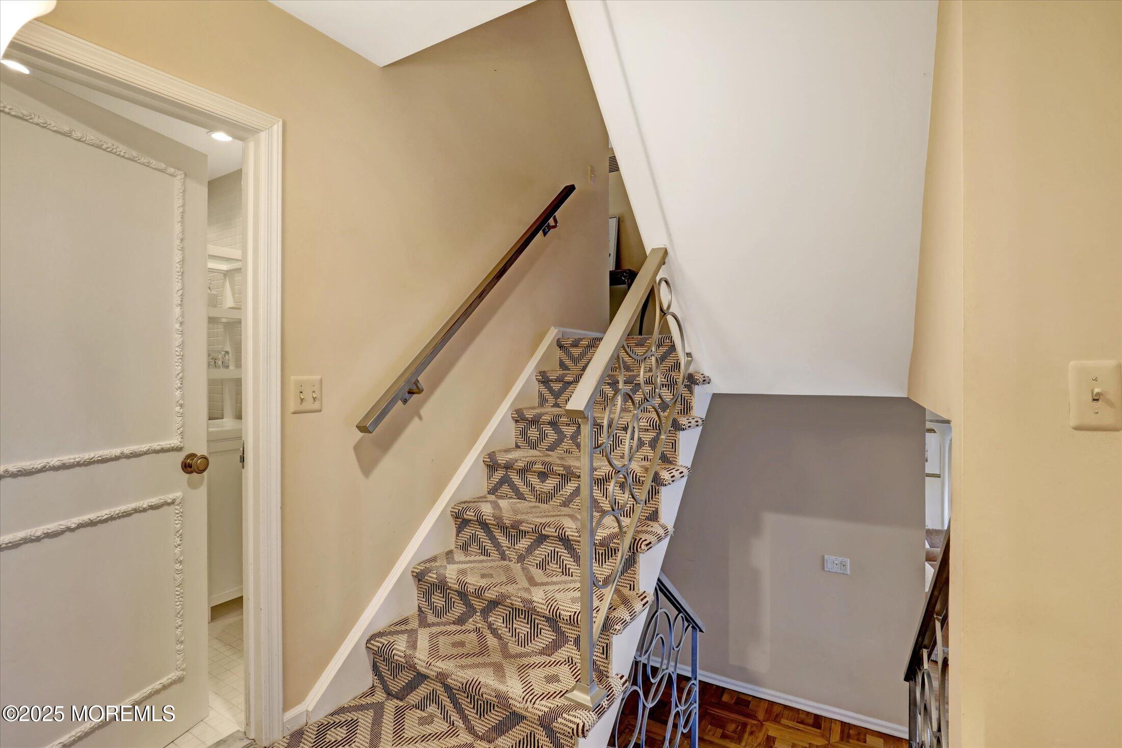 12 Woodford Road Deal, NJ 07723 - Photo 41 of 77 a view of stairs with wooden floor