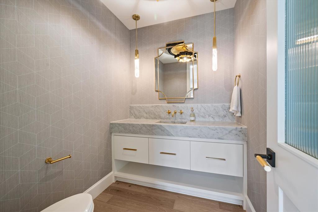 2951 Sunset Boulevard Flower Mound, TX 75022 - Photo 15 of 36 Powder Bathroom