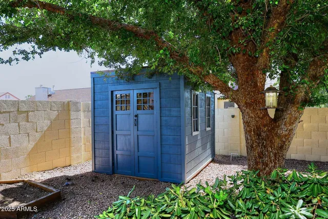 a house with a tree in front of it