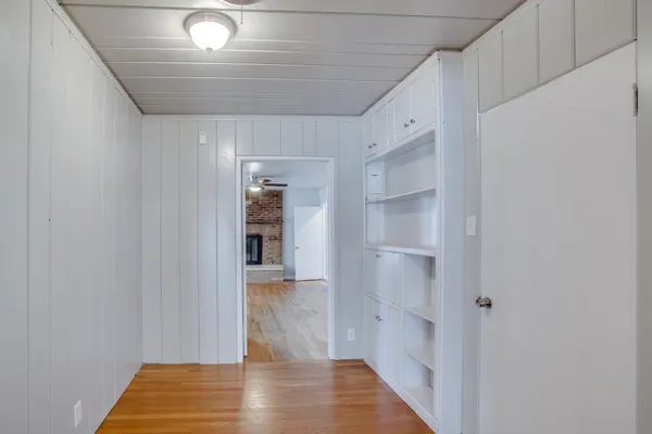 a view of entryway with wooden floor
