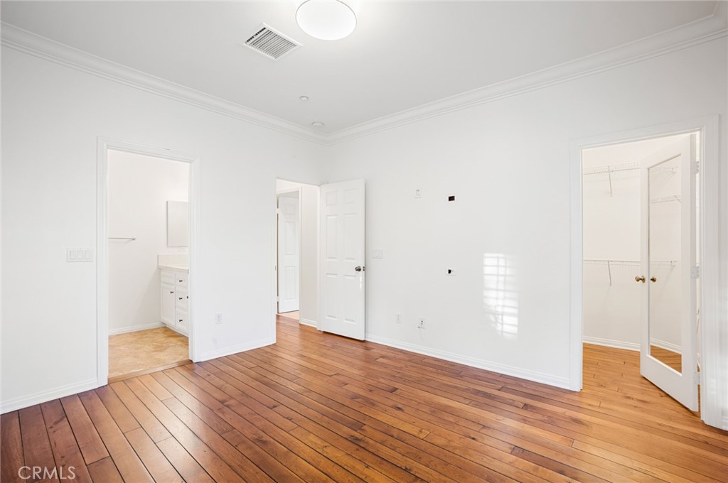 121 Danbrook Irvine, CA 92603 - Photo 9 of 16 a view of empty room with wooden floor
