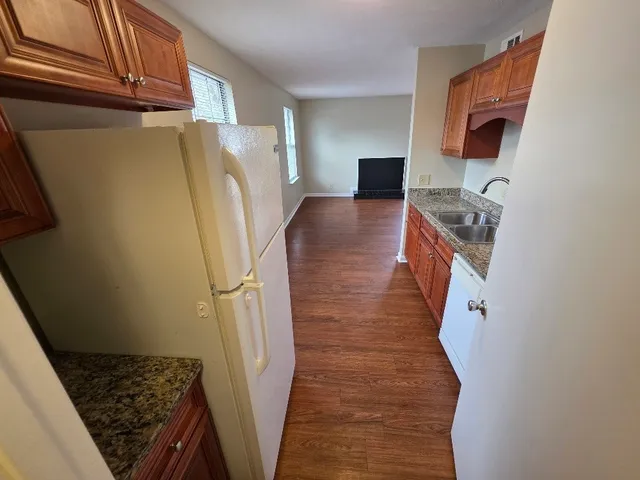 a view of a kitchen from a kitchen