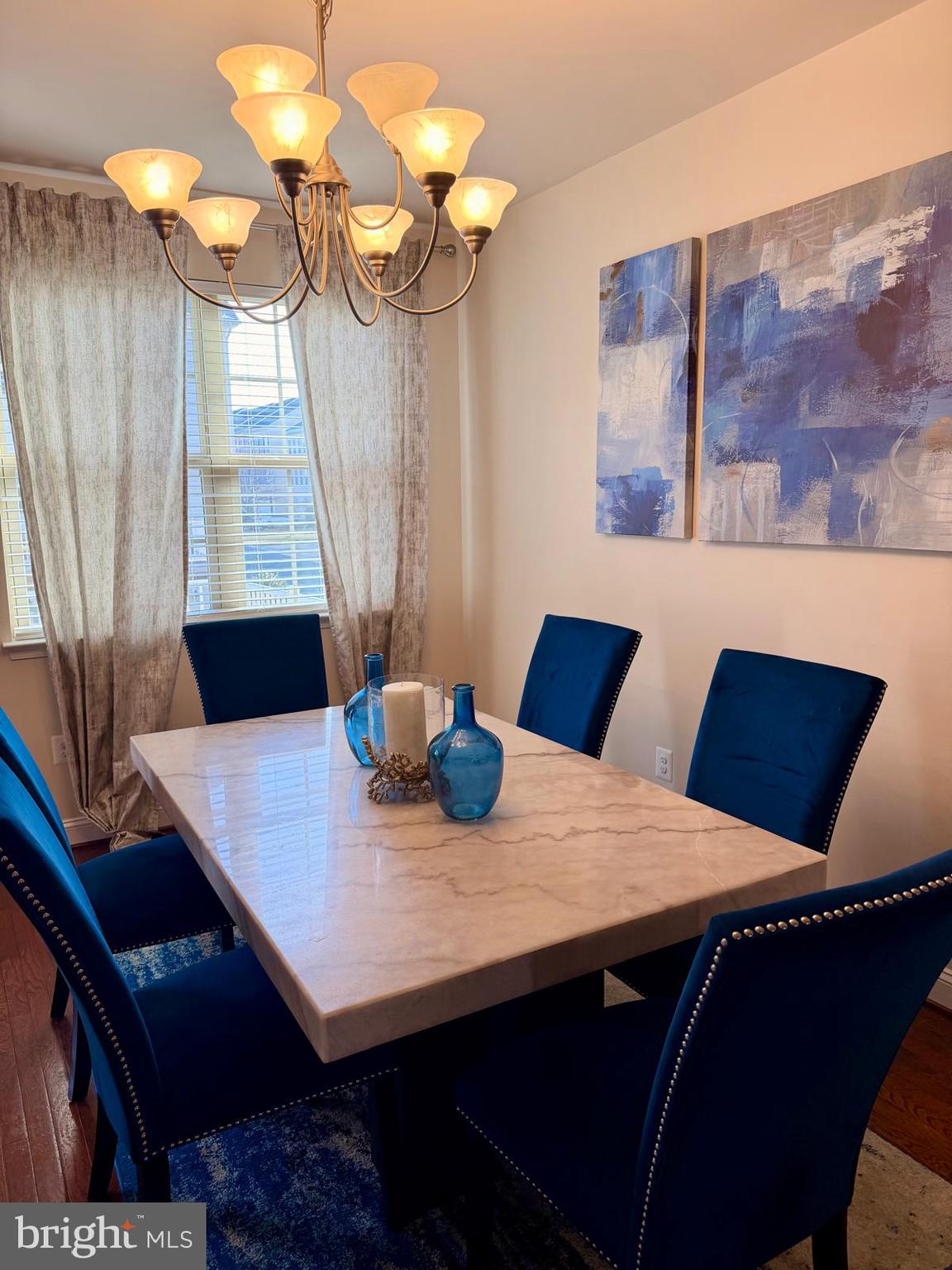 4502 Potomac Highlands Circle Triangle, VA 22172 - Photo 5 of 5 a view of a dining room with furniture and wooden floor
