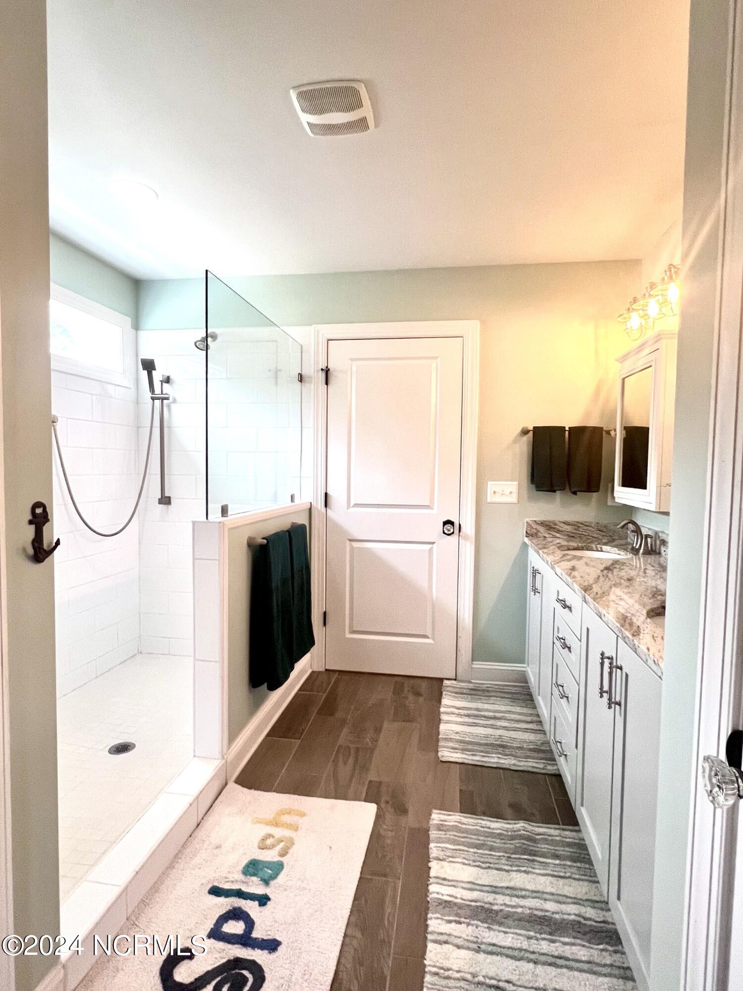 149 Great Oak Drive Hampstead, NC 28443 - Photo 19 of 38 Master walk-in shower