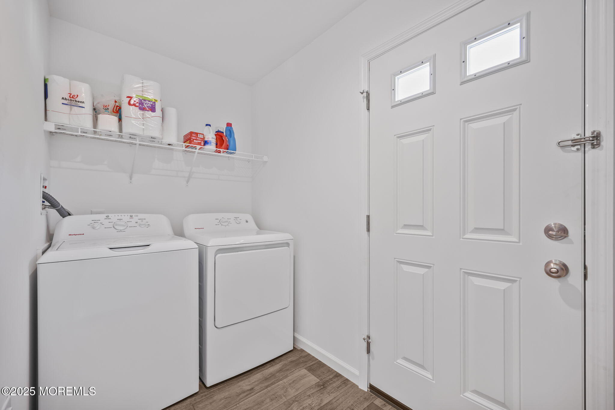 61 Village Road Morganville, NJ 07751 - Photo 2 of 2 a utility room with dryer and washer
