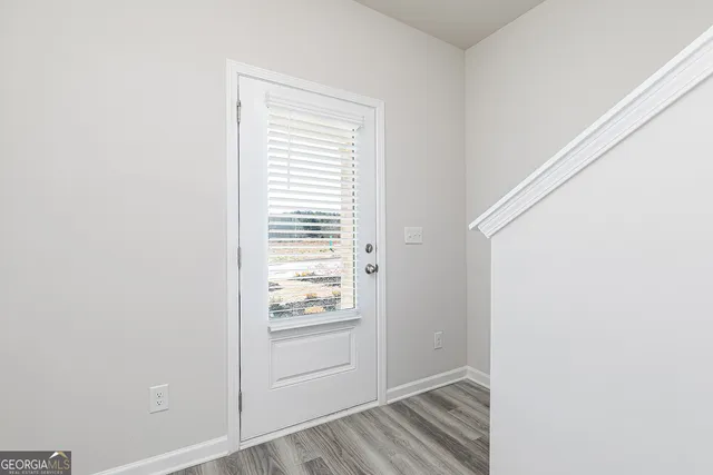 a view of walk in closet with window