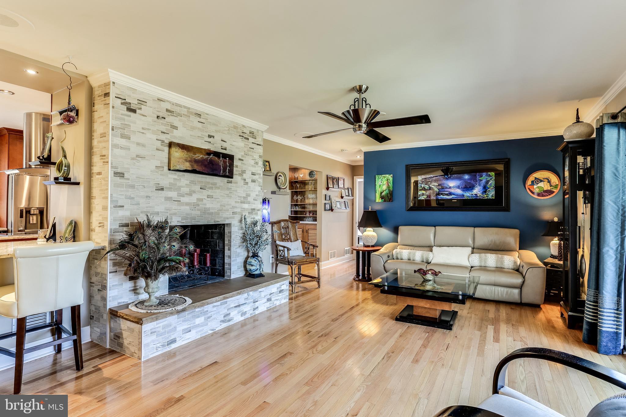 6412 Lochridge Road Columbia, MD 21044 - Photo 5 of 53 Living Room with Tiled Fireplace Surround