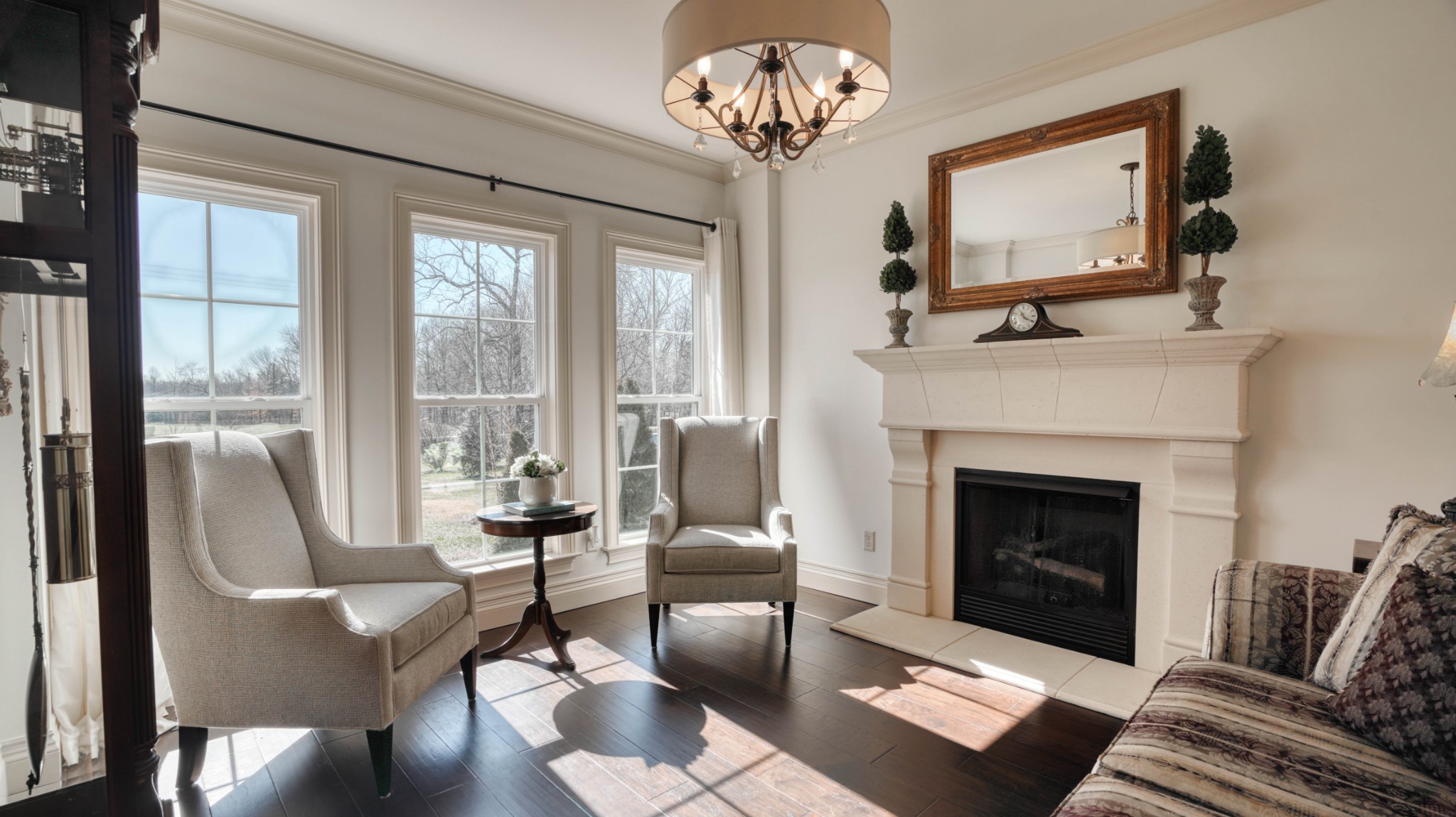 1368 Tidwell Switch Road Dickson, TN 37055 - Photo 13 of 69 a living room with furniture chandelier and a fireplace